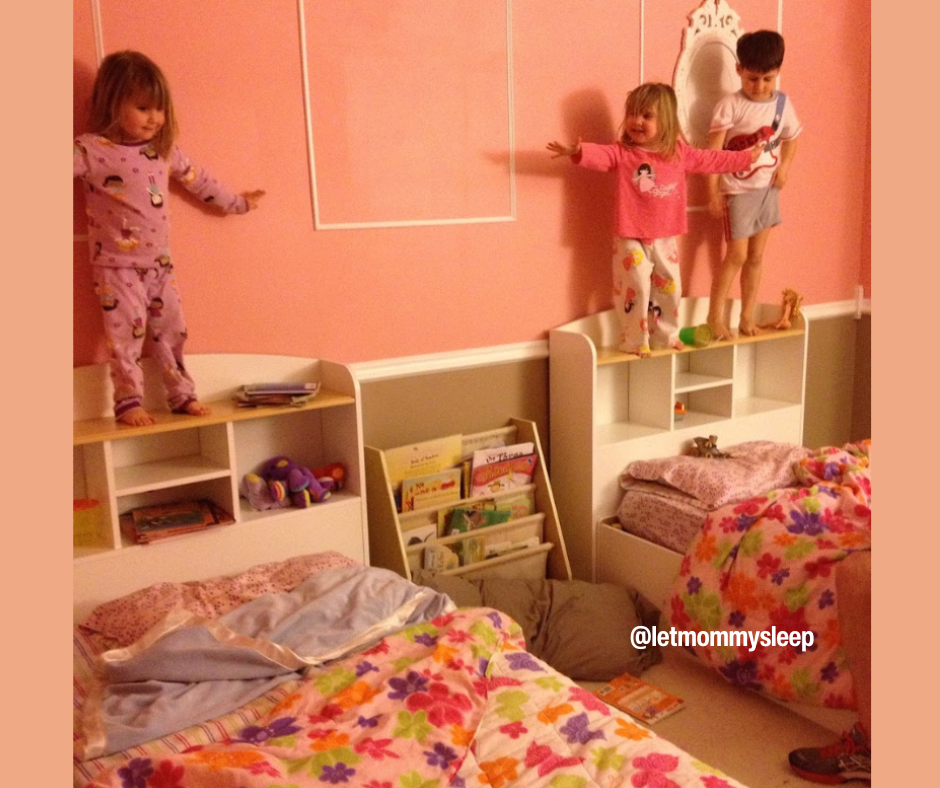 Twin toddlers and older brother getting ready to jump on beds
