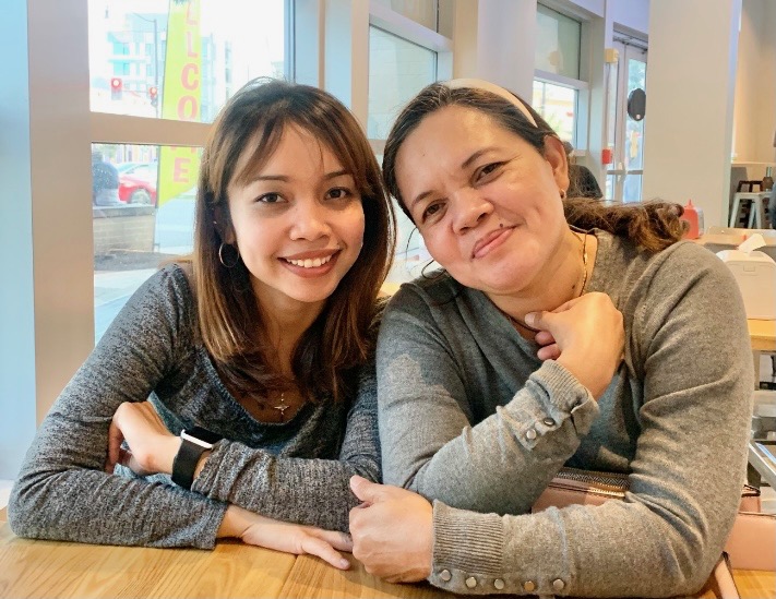 What Should I ask a Night Nurse? Two Newborn caregivers smiling.